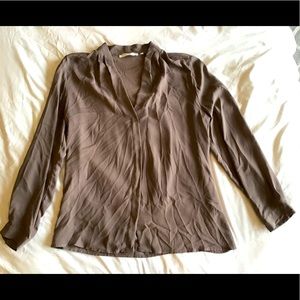 Silk like taupe blouse. Long sleeve v-neck